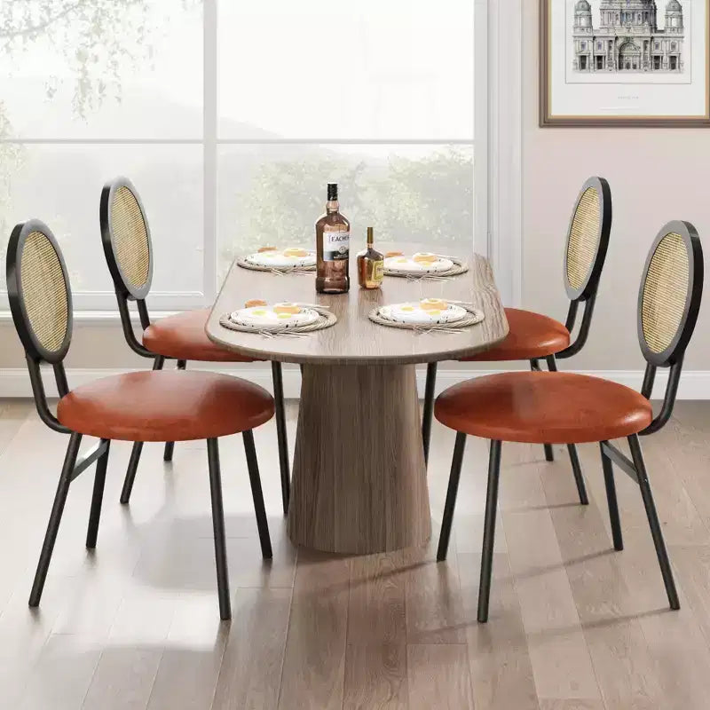 Chaises de salle à manger modernes rembourrées avec dossier en rotin naturel et pieds en métal